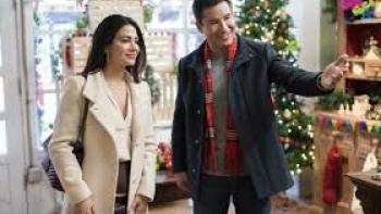 Holiday in Santa Fe: Mario Lopez and  Emeraude Toubia in a store