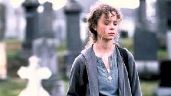 Homeless to Harvard: The Liz Murray Story: Thora Birch looks sad in cemetery