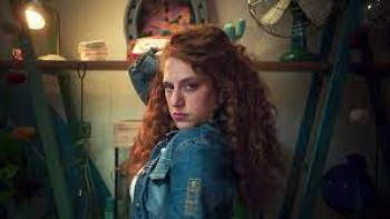 How to Deal with a Heartbreak:  Redheaded woman looks over her shoulder