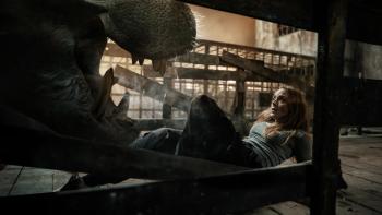 Hungry Movie: On her back, Sistine scrambles away from the gaping jaws of the angry hippopotamus