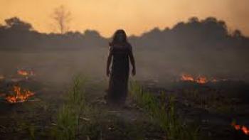 Hurricane Season scene 2: Woman walk outside as fires burn