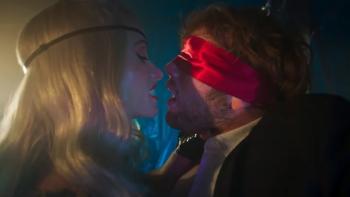 I Want Your Sex movie: Olivia Wilde grips Cooper Hoffman by the neck while he's wearing a red satin blindfold