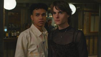 I Wish You All the Best movie: Couple Nathan (Miles Gutierrez-Riley) and Ben (Corey Fogelmanis) stand together, looking at something with alarm