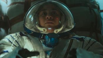 I.S.S. Movie: Ariana DeBose, in a spacesuit, looks straight ahead with a worried expression