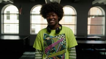 Immutable movie: Madison, a Black female student of the Washington Urban Debate League smiles 