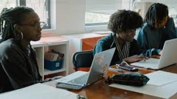 Immutable movie: Black students work on laptops