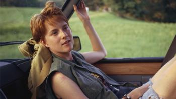 The Incredibly True Adventure of Two Girls: Lauren Holloman leans back casually in the back seat of a car