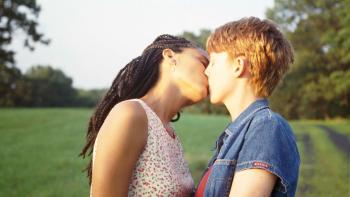 The Incredibly True Adventure of Two Girls: Nicole Ari Parker and Laurel Holloman kiss in the middle of a field