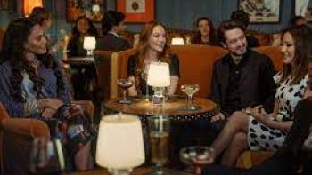 Irish Wish: Lindsay Lohan and a group of friends at a bar.