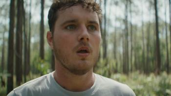 It Ends Movie: In the woods, Tyler (Mitchell Cole) has a look of surprise