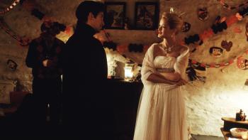 Liberty Heights: Adrien Brody and Carolyn Murphy talking at a Halloween party