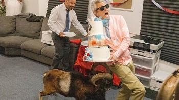 Jackass: Best and Last Movie: Chris Pontius and Johnny Knoxville (holding a tall cake) contend with an angry, horned goat