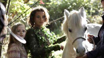 Jessie and the Elf Boy: a young girl and an elf with a pony