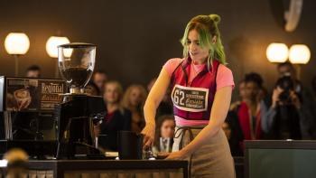 Coffee Wars: A thirty-something White woman with green hair makes a coffee in a coffee-making competition