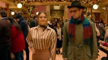 Jingle Bell Heist: Olivia Holt and Connor Swindells in a store.