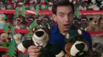 Jingle all the Way 2 Movie: Man holds two stuffed bears in shop
