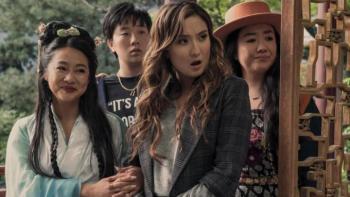 Joy Ride: Four Asian women are standing together and shown from the waist up. One wears a traditional Chinese dress and another looks quizzically at something off-camera. 