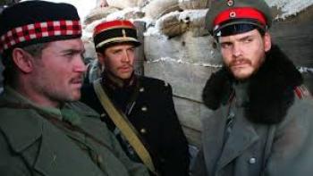 Joyeux Noel: Three soldiers look concerned