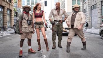 Jumanji: Open World Movie: Characters stand on a city street