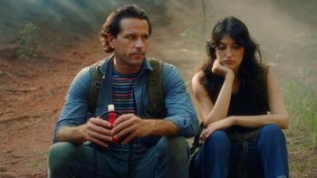 The Adventures of Jurassic Pet: Return to the Wild: A man and woman sit side by side with frustrated looks on their faces