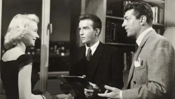 The Young Lions: Montgomery Clift and Dean Martin conversing with a female friend