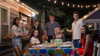 Kissing Is the Easy Part movie: A backyard celebration is interrupted, with everyone looking at something off camera