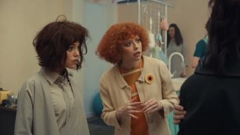 Klara and the Sun Movie: Two women talk in a room that's full of medical equipment
