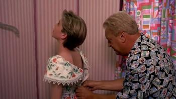 Ladybugs movie: Jonathan Brandis is zipped up in a dress by Rodney Dangerfield