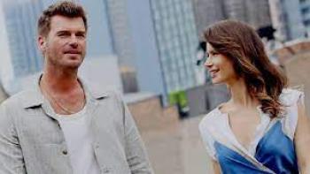 Last Call for Istanbul scene 2: Woman and man smile at each other