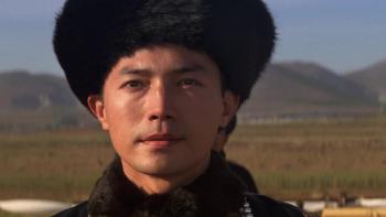 The Last Emperor Movie: Puyi as an adult, wearing a fur hat in Manchuria