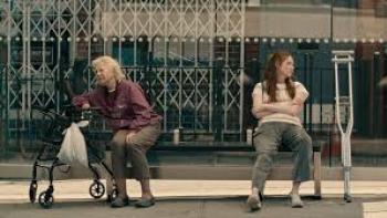 Late Bloomers movie: Malgorzata Zajaczkowska and Karen Gillan sit on a city bench