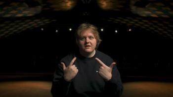 Lewis Capaldi: How I'm Feeling Now: Lewis Capaldi sits in a performance venue, pointing at himself as he talks
