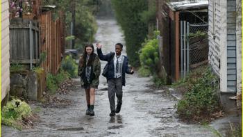 Little Wing: Brooklynn Prince and Che Safari walk down an alley.