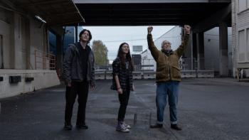 Little Wing: Simon Khan, Brooklynn Prince, and Brian Cox in the street.