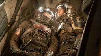 Long Distance Movie: Man and woman in spacesuits close together