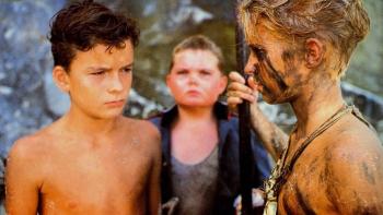 Lord of the Flies movie: Balthazar Getty and Chris Furrh, with face painted with black ash, stand face to face