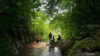 The Lost Children: Kids in river in jungle