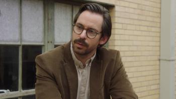 Lousy Carter Movie: Kaminsky (Martin Starr) converses with Carter (who's off-camera), looking vaguely annoyed