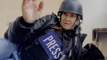 Love+War: Photojournalist Lynsey Addario in protective gear