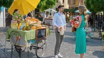 Love on the Right Course: Man and woman have a conversation by a flower cart
