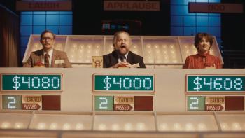 The Luckiest Man in America Movie: Michael, center, yells excitedly as he wins, his fellow contestants on either side of him