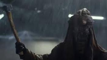 Lumberjack the Monster: Man in shadows with scythe