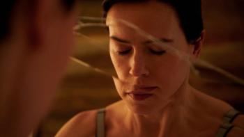 Magpie: Daisy Ridley has her eyes closed, her face reflected in a cracked bathroom mirror