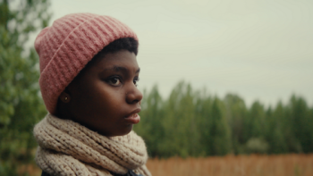 Makayla’s Voice: A Letter to the World: Makayla in a pink hat.