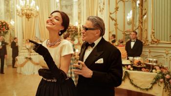 Maria movie: Angelina Jolie and Haluk Bilginer laugh at a black-tie reception