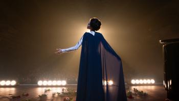 Maria movie: Angelina Jolie sings on stage as Marie Callas in a black cloak and gown