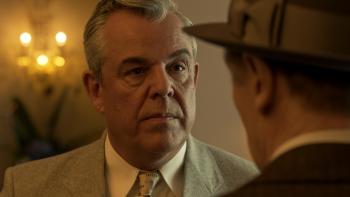 Marlowe Movie: Floyd Hanson (Danny Huston) appears on the left, facing off with Marlowe, who appears on the right, his back to the camera