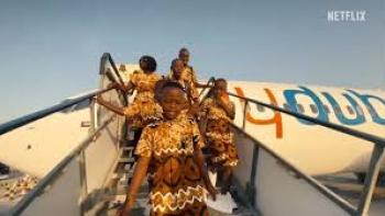 Masaka Kids: A Rhythm Within: Kids descend airplane on a performance trip.