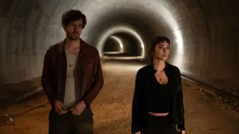 Masterplan: Two figures in a tunnel.