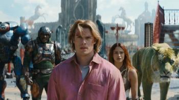 Masters of the Universe movie: Nicholas Galitzine stands in front of the camera wearing a pink shirt